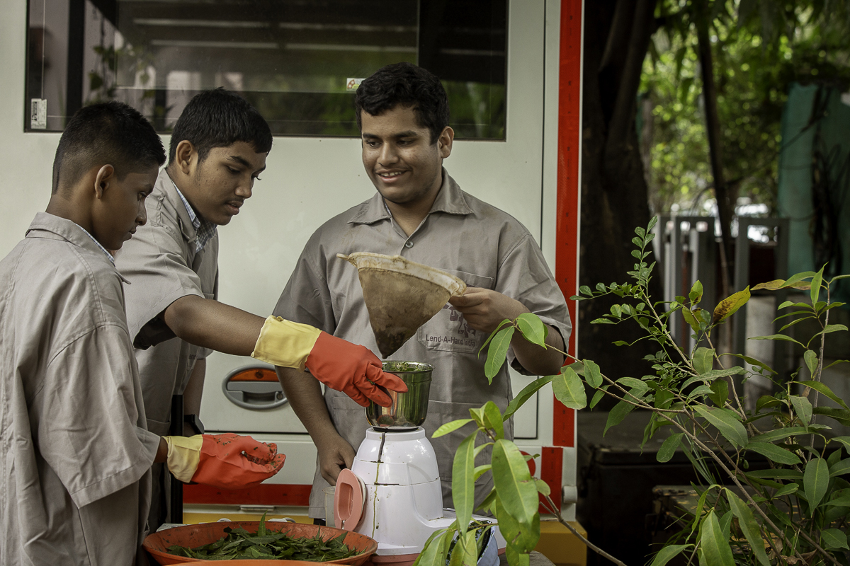 Students taking part in a practical Skills on Wheels activity